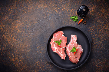 Raw meat  in cast iron pan