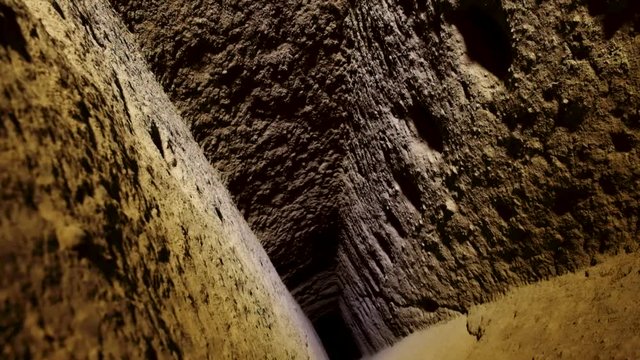 The Derinkuyu underground city is an ancient multi-level cave city in Cappadocia, Turkey. Stone used as a door in the old underground city