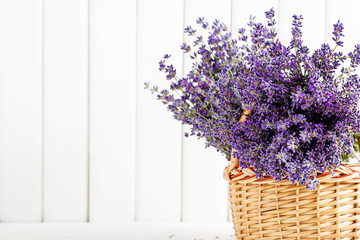 Naklejka premium Basket with lavender flowers.
