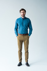 Fototapeta premium serious young man in casual clothing on white
