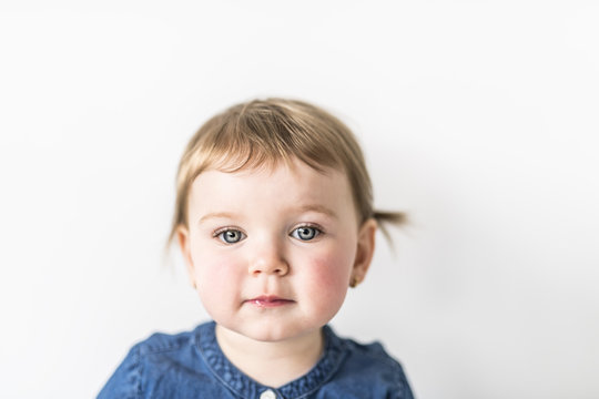 Portrait of a young girl on photo studio