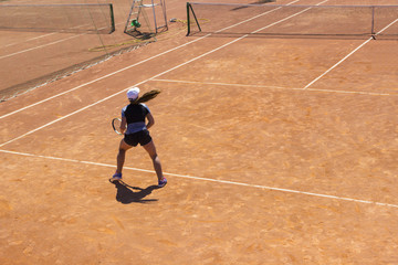 Fototapeta na wymiar Woman playing tennis. Young tennis player with a racket. girl playing tennis.