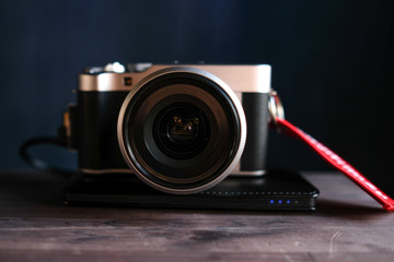 the camera is on a wooden table close-up