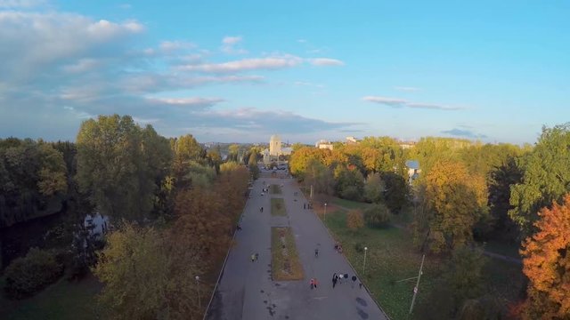 Air view of the beautiful city park and a beautiful blue lake in the city center on a sunny autumn day Ternopil Ukraine. Summer fun in the park. Summer vacation in the park. People are resting in the