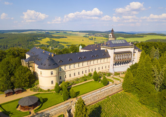 Aerial view of chateau Zbiroh. Romanesque-Gothic castle was founded at the end of the 12th century....