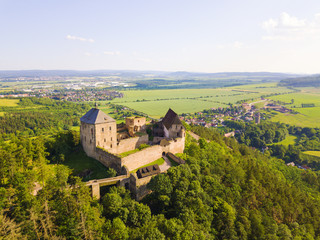 Fototapeta na wymiar Aerial view of castle Tocnik. Gothic fortress from 14th century. Famous tourist attractions in Czech republic, European union.