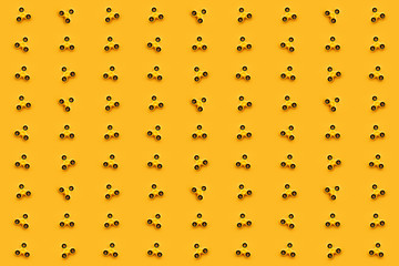 Seamless pattern background of yellow fidget spinner toy