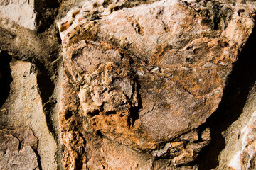 Close up of natural stone wall. Stone wall texture 