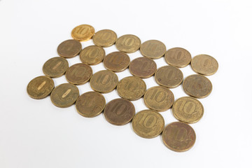 a bunch of Russian coins on a white background of and 10 rubles.