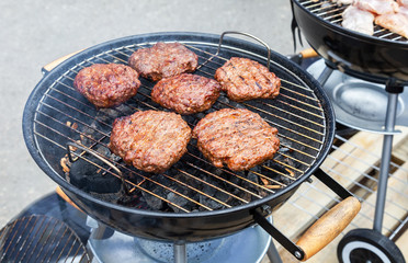 Barbecue with delicious grilled meat on the hot coals of grill