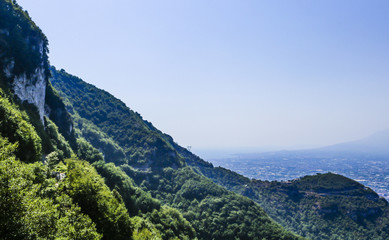 Fototapeta na wymiar Foggy view of towns south of Mount Vesuvius, Italy