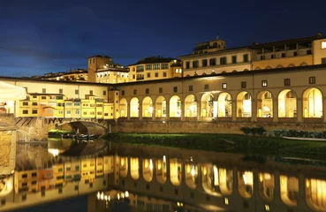 Deurstickers night view of Florence or Firenze city and the Arno river Italy © photo_stella