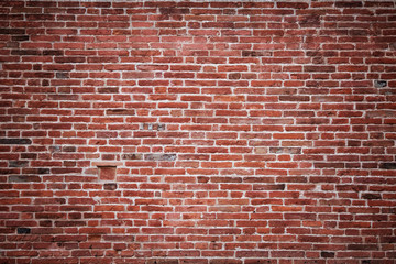 Fototapeta na wymiar The texture of an old brick wall.