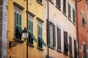 Old Italy windows and wall background texture.
