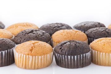 homemade cupcakes isolated on white background, close up
