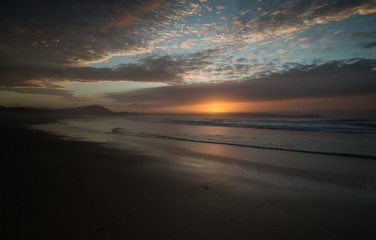 Fototapeta na wymiar Beautiful beach at sunset