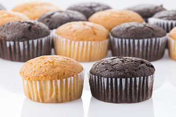 homemade cupcakes isolated on white background, close up