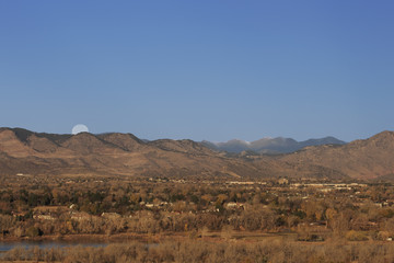 Full moon over Rocky Mountains