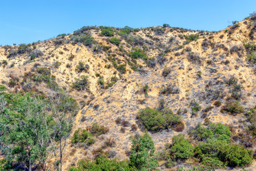Fototapeta na wymiar Dry summer hills of Southern California on warm morning
