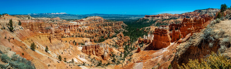 Panoramic View of Bryce Canyon National Park From the Rim Trail. A popular trail above Bryce Canyon that connects all the scenic overlooks from Fairyland Point to Bryce Point.