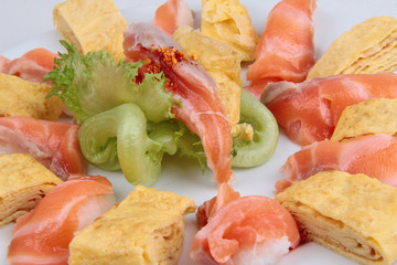Salmon sushi ,Japanese Rolled Omelette as Tamagoyaki  and salmon salad topped chili .