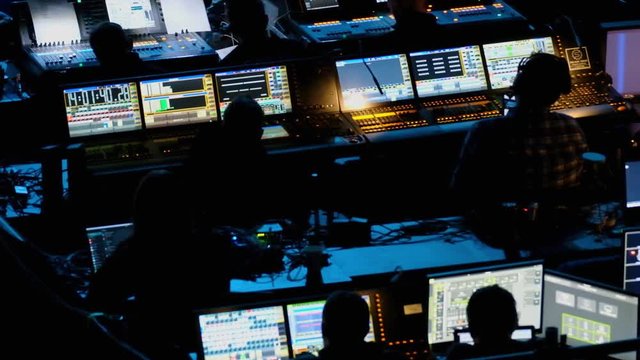 Technical staff is working at the conference, audio and video equipment in progress