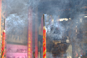 Burning incense in a Chinese Temple