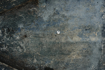 texture of battered, dirty and old brick wall and floor of various colors