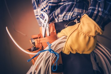 Electrician with Electric Cable - obrazy, fototapety, plakaty