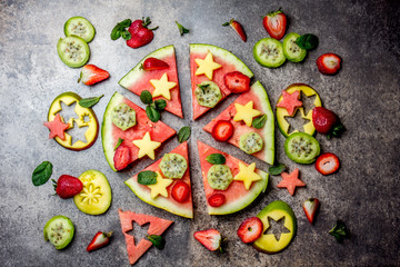 Fruit pizza. Watermelon mango, tuna and berries pizza. top view