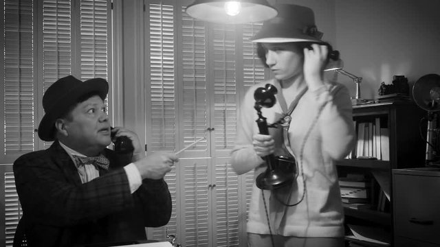 A 1940s newsroom with a female reporter who picks up press camera and walks out of scene