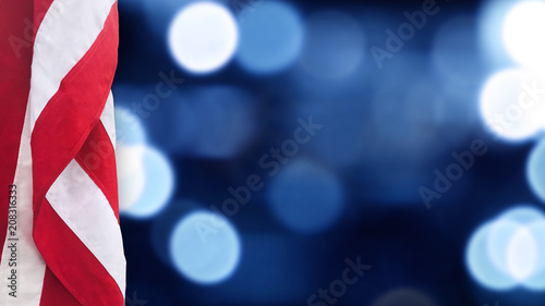 American Flag With Blue Bokeh Lights Background for United States Holidays