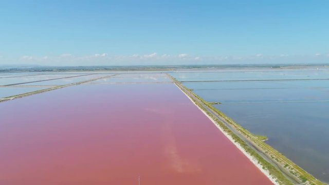 The saltpan Saline stretches Margherita di Savoia Apulia City Sea Coastline sed water in Italy Drone flight