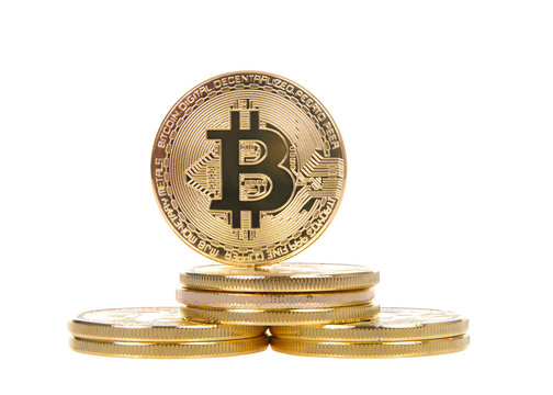 Digital Cryptocurrency currency. Golden bitcoin coin stacked and isolated on white background. Physical bit coins