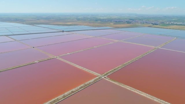 The saltpan Saline stretches Margherita di Savoia Apulia City Sea Coastline sed water in Italy Drone flight
