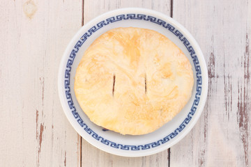 Butter shortcakes  on wooden table     