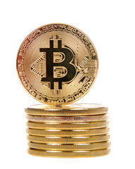 Digital Cryptocurrency currency. Golden bitcoin coin stacked and isolated on white background. Physical bit coins
