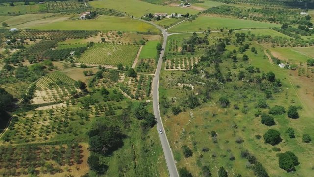Car drive on the road in Italy Drone