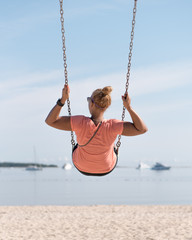 Swinging on the beach