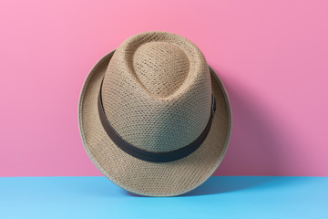 men fashion hat on blue and pink paper , minimal style background