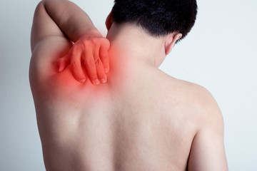 Naklejka premium back of man suffering from shoulder pain