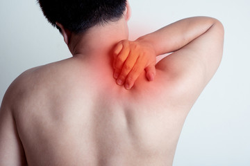 back of man suffering from shoulder pain