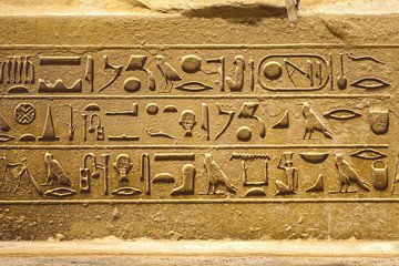 Ancient Egyptian hieroglyphs on stone slabs