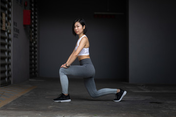 Young Woman doing Pilates lunge - obrazy, fototapety, plakaty