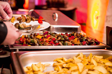 shish kebab from vegetables as a garnish at a party