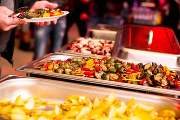 shish kebab from vegetables as a garnish at a party