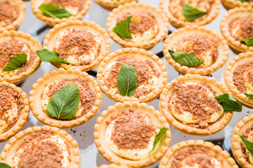 tartlets with mascarpone cheese on a buffet table