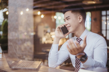 Business man working at office with laptop and documents on his desk, consultant lawyer concept, Business man working at Cafe with laptop.