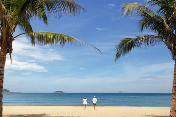 Fototapeta na wymiar landscape of a tropical sandy beach with a running cauple