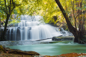 waterfalls in deep forest atNational Park  ,A beautiful stream water famous rain forest waterfall in Thailand
